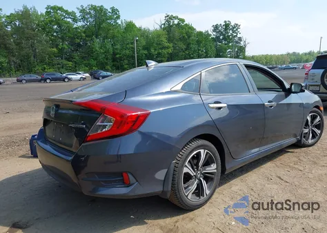2016 Honda Civic Touring z USA, uszkodzony, nr VIN 19XFC1F97GE010605